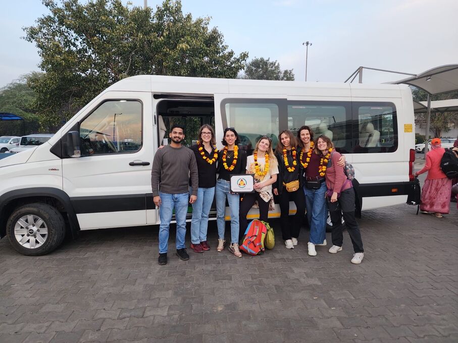 Luxury private India tour travellers with their car and driver