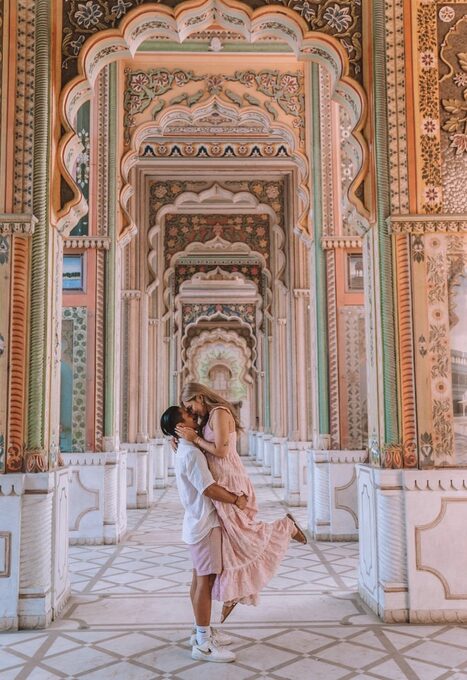 Traveller at the colourful Patrika Gate in Jaipur