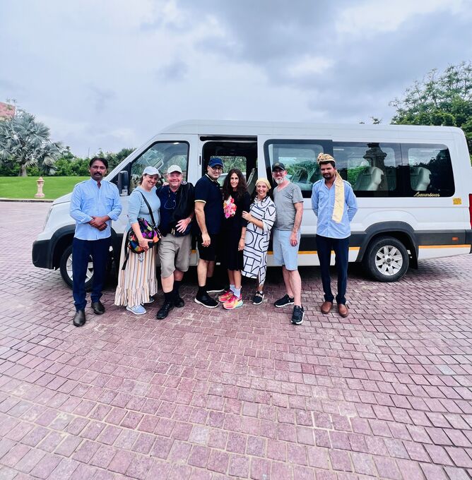 Travellers with their private tour vehicle in India