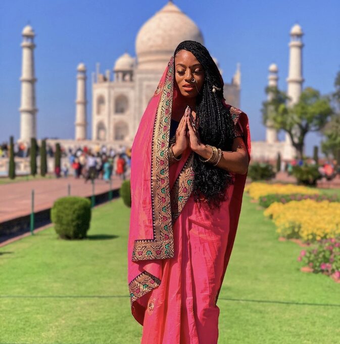 Traveller in a saree at the Taj Mahal, Agra